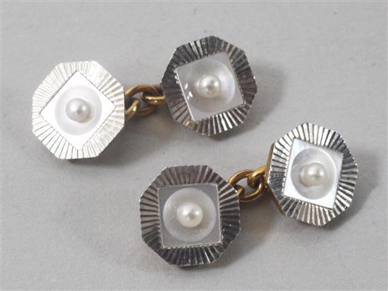 A pair of 18ct gold, platinum, mother of pearl and seed pearl set octagonal cufflinks.